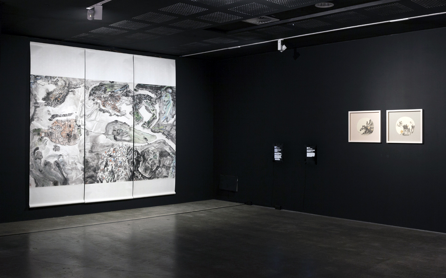 Installation view of three artworks