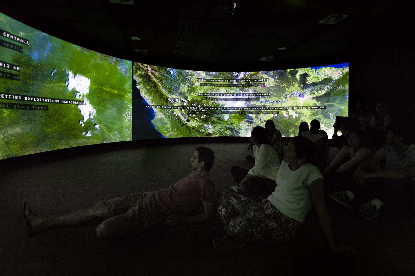 People watching a screen