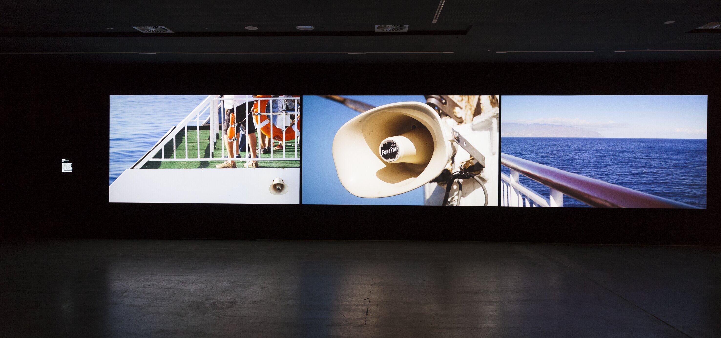 Installation view of three screens