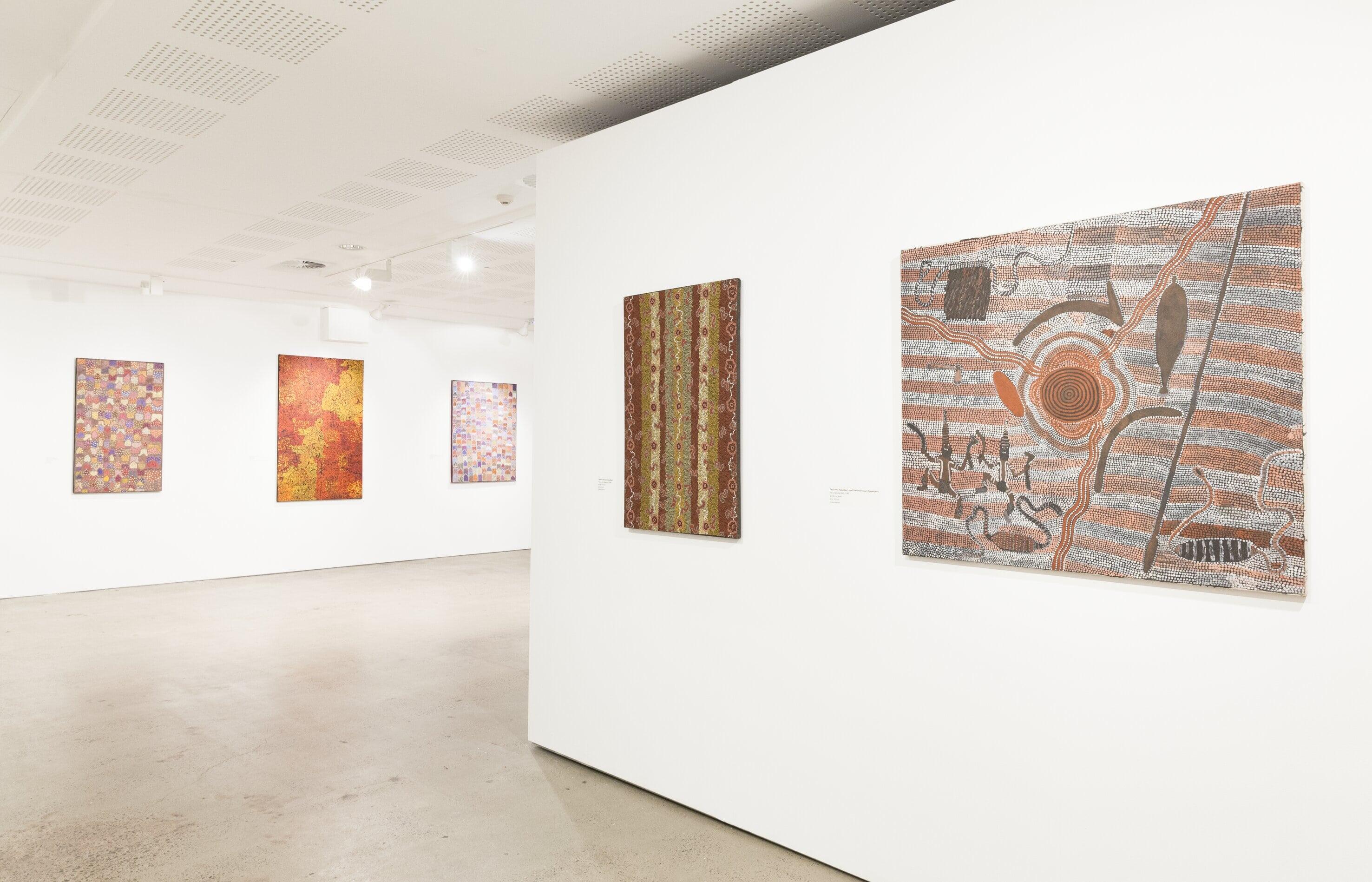 Installation view, 'Streets of Papunya: the re-invention of Papunya painting', UNSW Galleries, 2015.