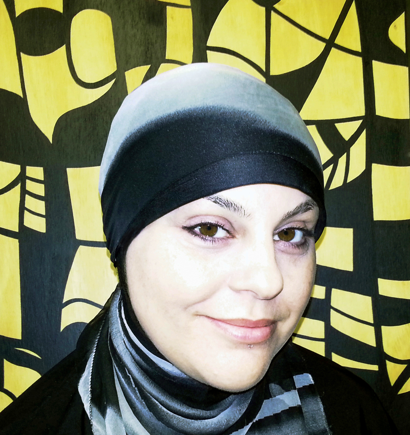 Portrait of curator Nur Shkembi