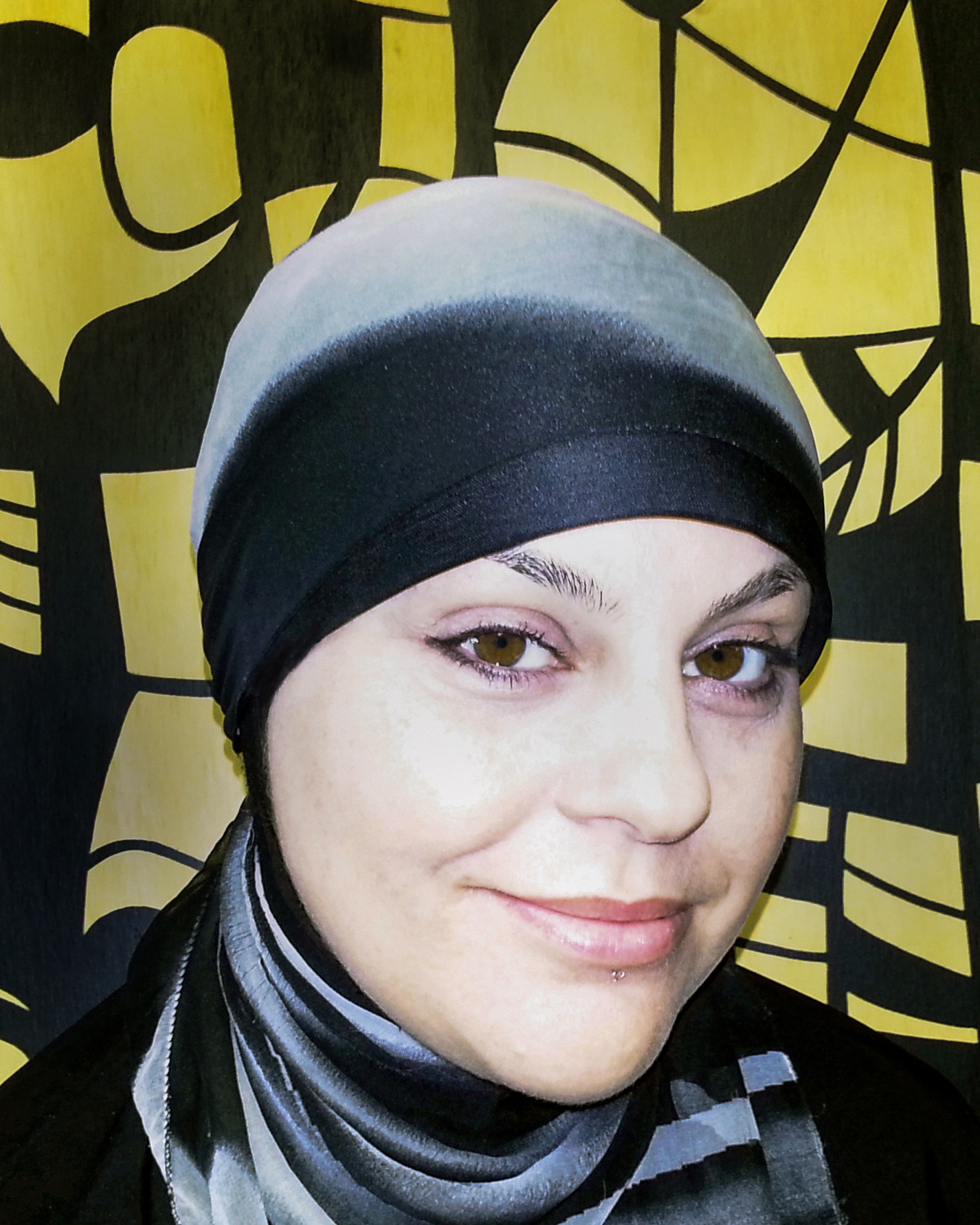Portrait of curator Nur Shkembi