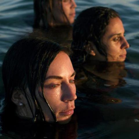 River Journey features Marine Mathematicians by Tamara Dean. The photo shows UNSW Coastal and Regional Oceanography Lab researchers Nina Ribbat, Dr Paulina Cetina-Heredia and Dr Amandine Schaeffer in the field at Sydney's Botany Bay.