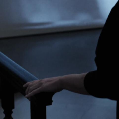 Hand on railing